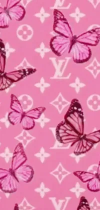 This phone live wallpaper showcases a beautiful pattern of pink butterflies set against a matching pink background