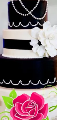 This dark and sophisticated live wallpaper for mobile devices showcases a wedding cake on a table