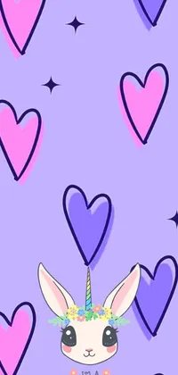 This phone live wallpaper showcases a stunning purple background filled with cute pink hearts and accompanied by a cartoon unicorn face