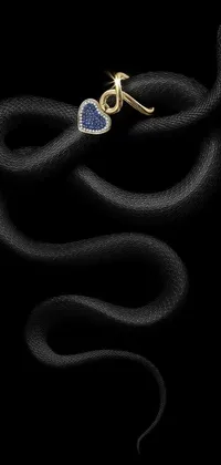 This close-up live wallpaper features a vibrant snake, rendered in keyshot, set against a black background