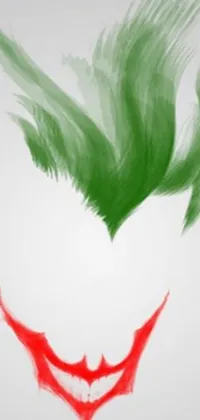 This live phone wallpaper features an eye-catching green and red joker face design with a trident symbol and background rooster