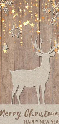 This live phone wallpaper features a festive Christmas card design complete with a deer and snowflakes
