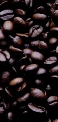 This stunning live wallpaper features a captivating close-up photograph of a pile of coffee beans