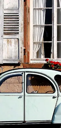 This stunning live wallpaper features an old car parked in front of a historic building, adding a touch of vintage elegance to your phone