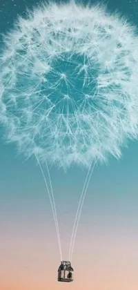This phone live wallpaper features a charming white dandelion floating as an air balloon in a teal sky, made of cotton candy fluff