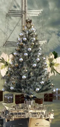 This stunning live wallpaper features a Christmas tree perched atop a boat, complete with glittering silver ornaments and a serene winter moonlit background