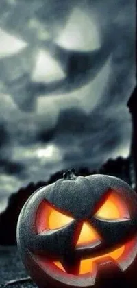 This Halloween-themed live wallpaper features a spooky pumpkin sitting in front of a gothic-style church
