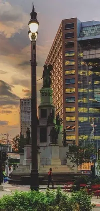 Transform your phone background with this live wallpaper depicting a street light and tall building in Cleveland's Market Square