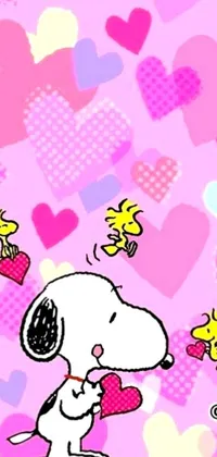 This lively phone live wallpaper features a cheerful cartoon dog cradling a sparkling heart atop a dreamy pink background where fluffy peanut details act as vintage reference
