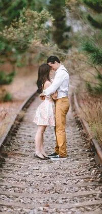 Enjoy a serene and romantic backdrop with this train track live wallpaper