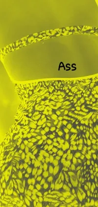 This phone live wallpaper features a close-up of a woman wearing a bikini top, with a yellow aura surrounding her