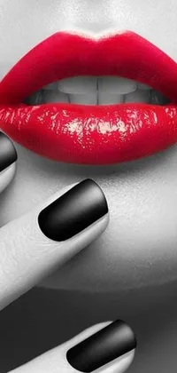 This phone live wallpaper features a striking woman with red lips and black nails, bringing together the classic style of Helmut Newton, pixabay images and the dynamic nature of pop art
