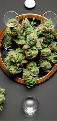 This dynamic live wallpaper showcases a mesmerizing digital rendering of a bowl filled with herbs, set on a table as the focal point of the design