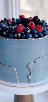 This stunning phone live wallpaper features an eye-catching blue cake sitting atop a white cake plate