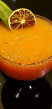Looking for a unique live wallpaper to spice up your phone screen? Check out this one, featuring a close-up of a slushy drink in a translucent glass