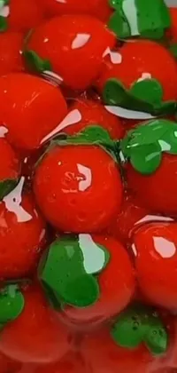 This dynamic phone animation captures a lovely closeup view of a bowl full of vibrant red tomatoes placed on a table