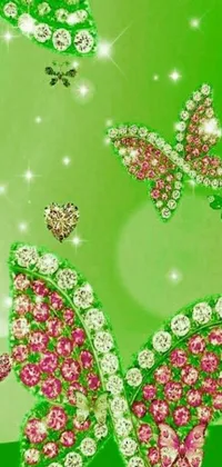 Get mesmerized by a playful live wallpaper with a green background adorned by pink and white butterflies