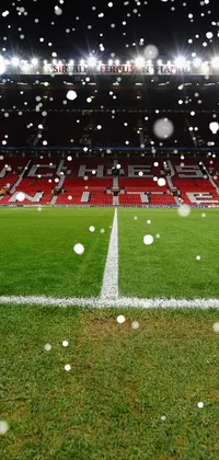Looking for an engaging live wallpaper for your mobile device? Look no further than this soccer field design featuring "Manchester United" in bold letters