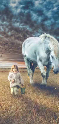 This live wallpaper features a stunning colorized photo of a little girl and a white horse in a lush green field