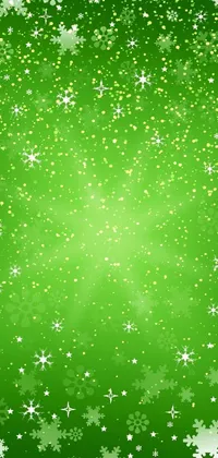 This live wallpaper features a green background adorned with snowflakes and stars in vector art