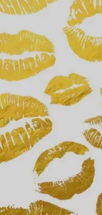 This phone live wallpaper features a striking close-up view of colorful lipstick prints on paper