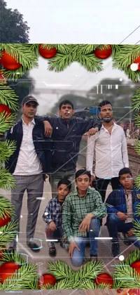 This phone live wallpaper depicts a scene of men standing on a train track next to the Kalighat temple, with CG graphics and a happy family in the foreground