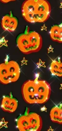 This Halloween live wallpaper boasts a cluster of colorful pumpkins against a black backdrop, complete with glittering stars and refracted sparkles