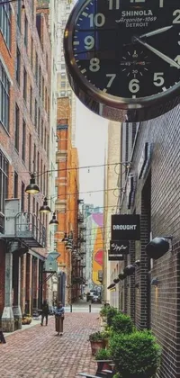 This live wallpaper features a clock hanging from a brick building in Vancouver