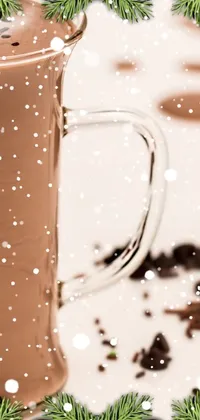 This stunning phone live wallpaper features a mouth-watering cup of hot chocolate resting on a table