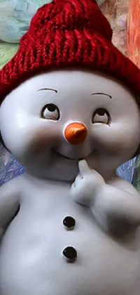 This live phone wallpaper depicts a snowy background with a digital rendering of a snowman wearing a red hat