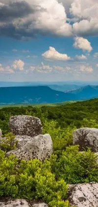 This live wallpaper for your phone depicts a stunning scene of rocks on a hill in West Virginia