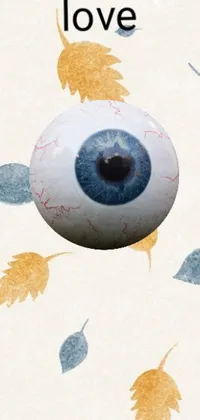 This phone live wallpaper features a mesmerizing blue eye close-up against a backdrop of leaves for a surreal and natural aesthetic