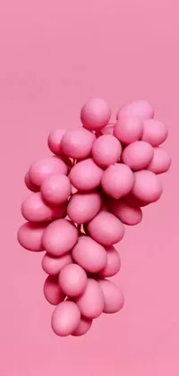 This lively pink phone wallpaper features an arrangement of playful pink eggs on a soft pink background, creatively arranged to provide depth and dimension to the design