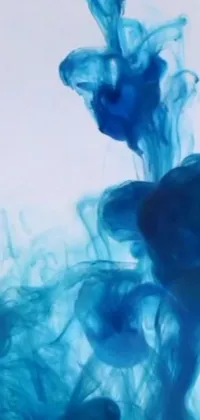This blue ink-in-water wallpaper is perfect for those who love mesmerizing visuals