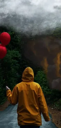This phone live wallpaper depicts a surreal and ominous scene with red balloons and a thunderstorm looming in a cinematic forest on fire