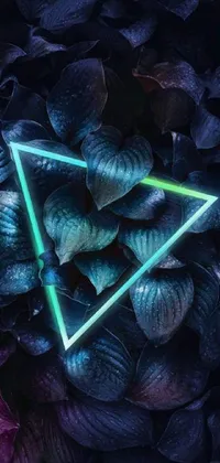 This phone live wallpaper features a stunning neon triangle surrounded by vibrant purple and green leaves