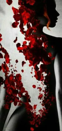 This phone live wallpaper highlights a powerful image of a woman adorned with striking red petals