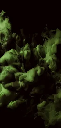 This live wallpaper features a stunning digital artwork of green smoke floating in the air