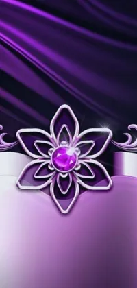 Looking for a beautiful and elegant live wallpaper for your phone? Look no further than this stunning design featuring a purple background with a diamond-embellished flower