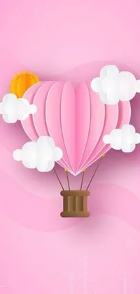 This live phone wallpaper features a heart-shaped hot air balloon in soft shades of pastel, delicately floating amidst dreamy pink anime clouds and paper origami