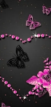 This phone live wallpaper features a stunning heart made entirely of beautiful pink flowers and flitting butterflies