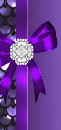 Bring elegance and luxury to your phone with this mesmerizing phone live wallpaper! Featuring a beautiful purple ribbon with a festive bow and sparkling gems and diamonds throughout, this stunning digital art is sure to catch the eye