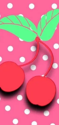 This live phone wallpaper features a vibrant design with two cherries up close on a polka dot background