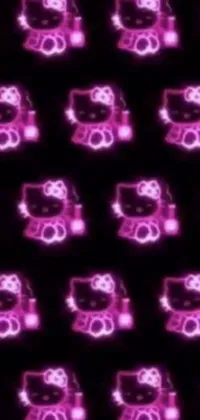 Looking for a fun and feminine live wallpaper for your phone? Check out this playful design featuring a pattern of pink teddy bears on a sleek black background