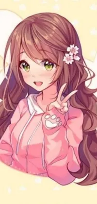 This phone live wallpaper features a charming anime drawing of a girl wearing a cozy pink hoodie with long brown hair and a flower in her hair