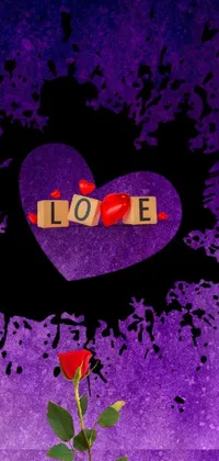 This phone live wallpaper boasts a captivating rose in a vase with the word "love" written on it, set against a stunning background with a shattered paint effect in shades of purple