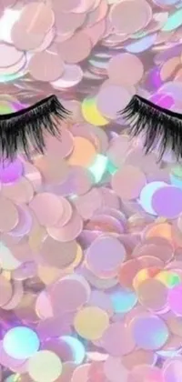 Transform your phone's look with this stunning live wallpaper featuring a close-up of eyelashes captured in great detail, set against a beautiful album cover background and complimented by a Tumblr-esque glitter design