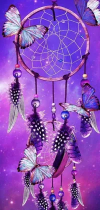 This stunning phone live wallpaper features a colorful and intricately crafted dream catcher adorned with beautiful butterflies against a vibrant purple background