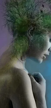 This phone live wallpaper depicts a woman with a tree in her hair, surrounded by a beautiful blue, purple, and green digital landscape