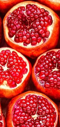 Showcase your phone's display with this mesmerizing live wallpaper featuring digitally rendered pomegranates in high-resolution - 64x64